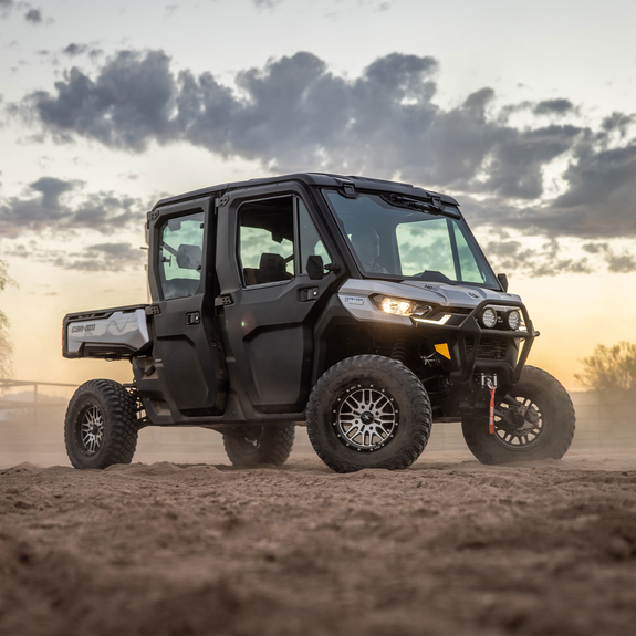 Lifestyle Image of Can-Am Defender on Farm