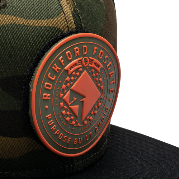 Close Up View of RF Rubber Patch on Camo Snapback Hat